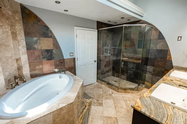 a bathroom with a sink and mirror