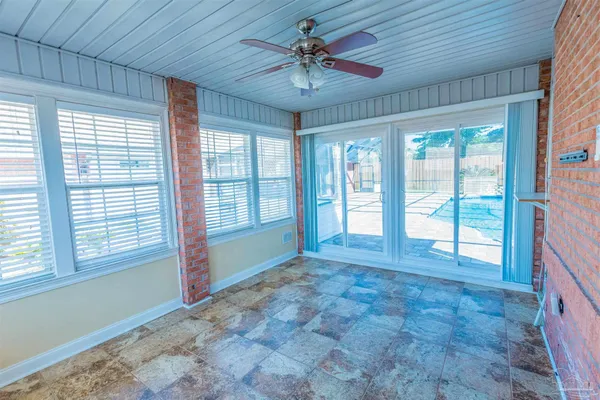 a view of an empty room and window