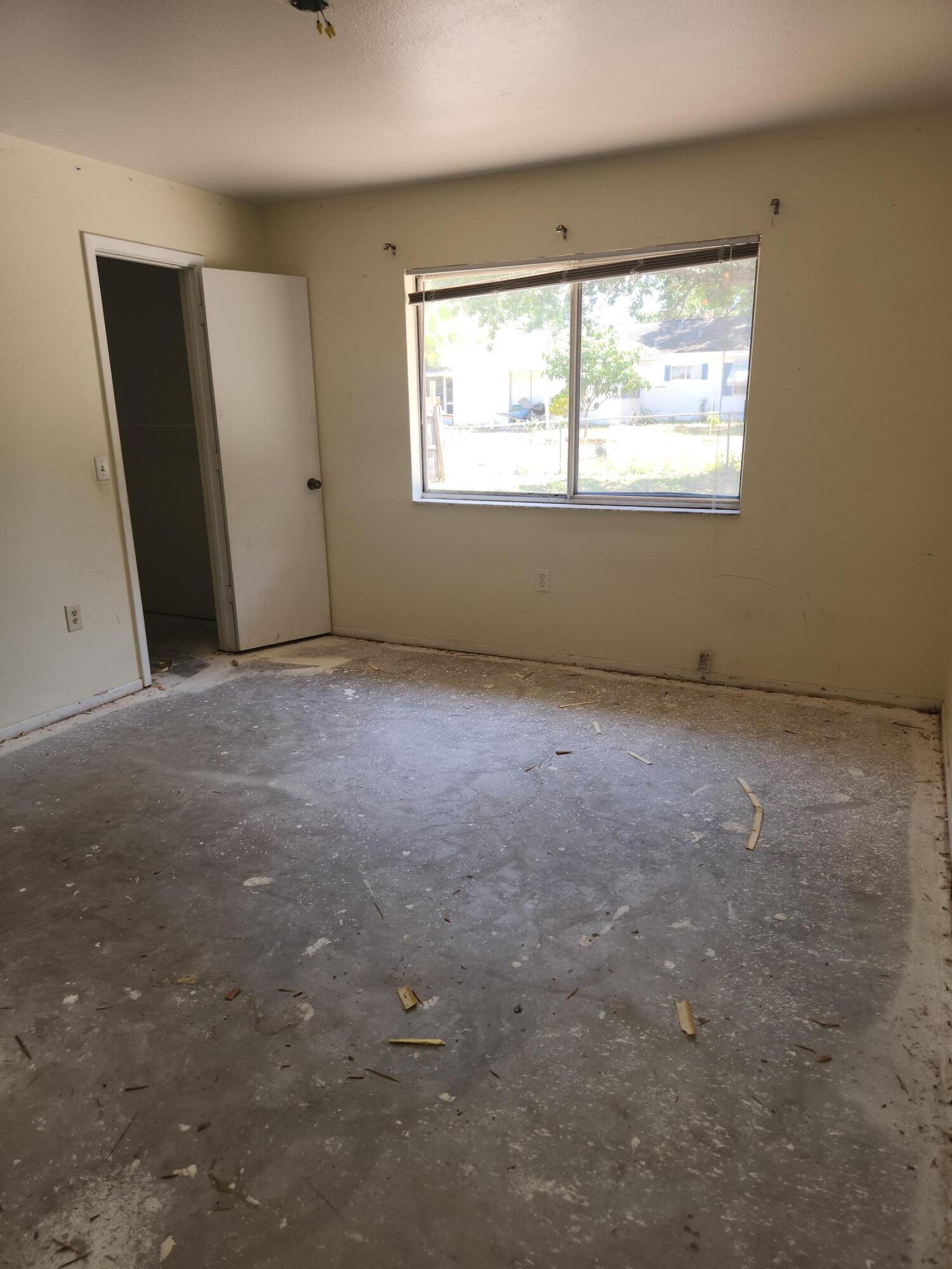 951 Palm Street Cocoa, FL 32927 - Photo 14 of 34 an empty room with windows