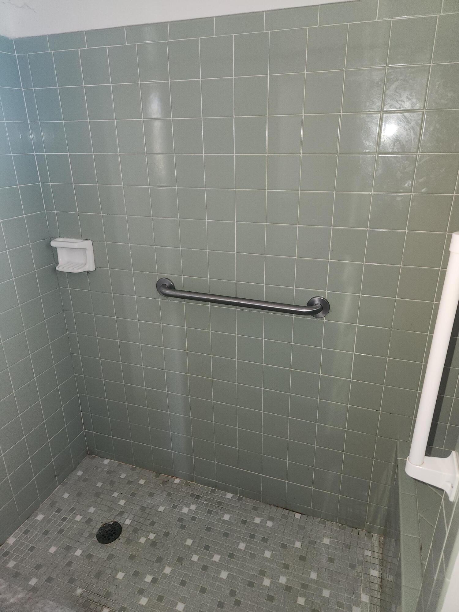 951 Palm Street Cocoa, FL 32927 - Photo 16 of 34 a bathroom with a shower