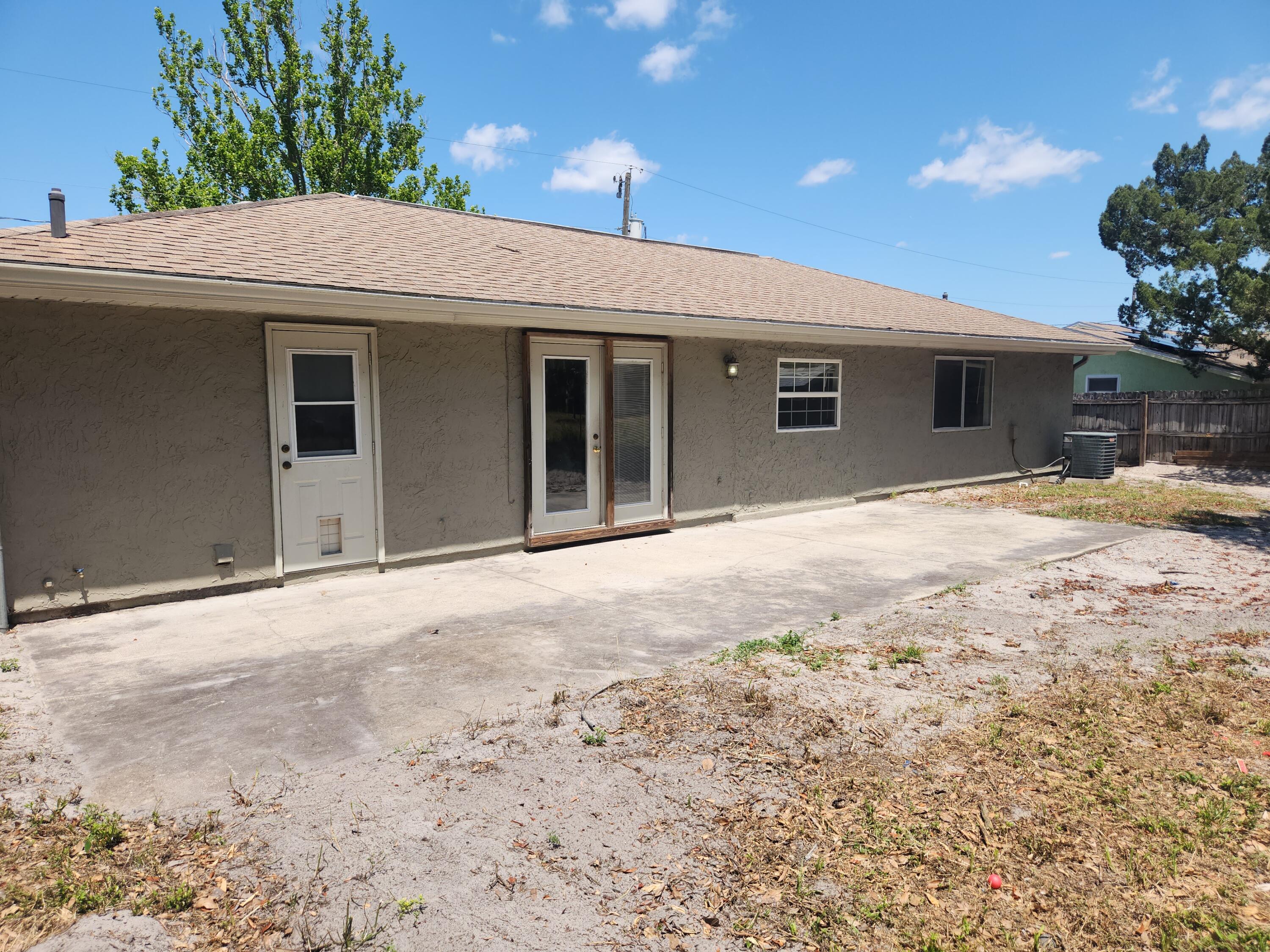 951 Palm Street Cocoa, FL 32927 - Photo 3 of 34 a view of a house with a yard