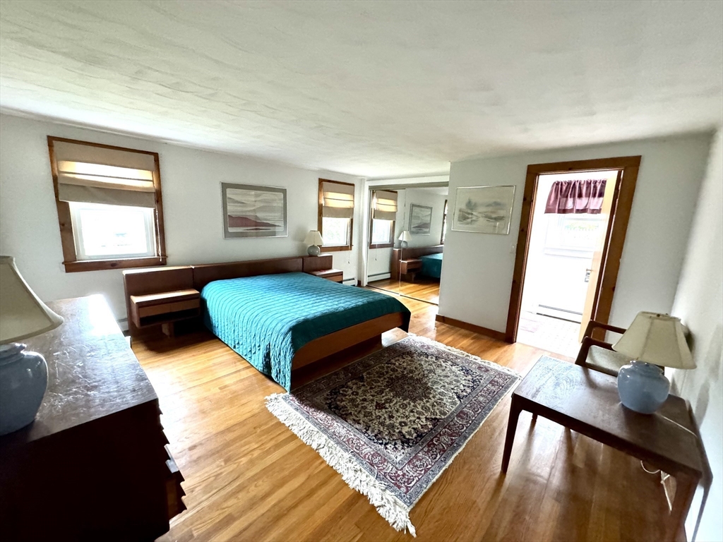 24 Shore Road West Dennis, MA 02670 - Photo 11 of 28 a bedroom with a bed window and a dresser