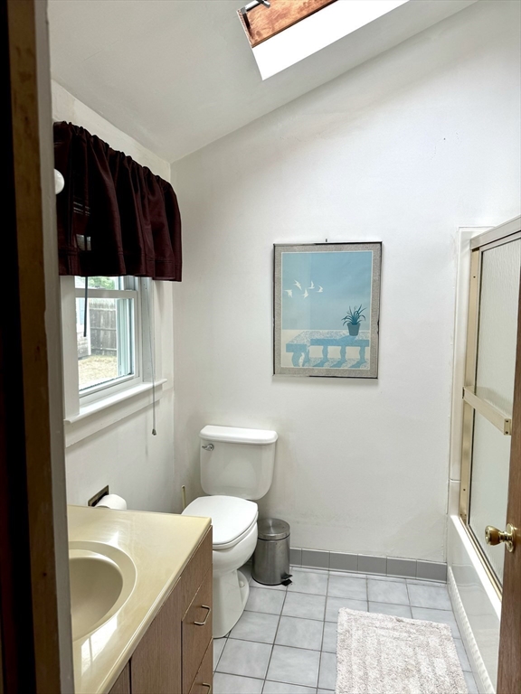 24 Shore Road West Dennis, MA 02670 - Photo 17 of 28 a bathroom with a sink a toilet and a shower