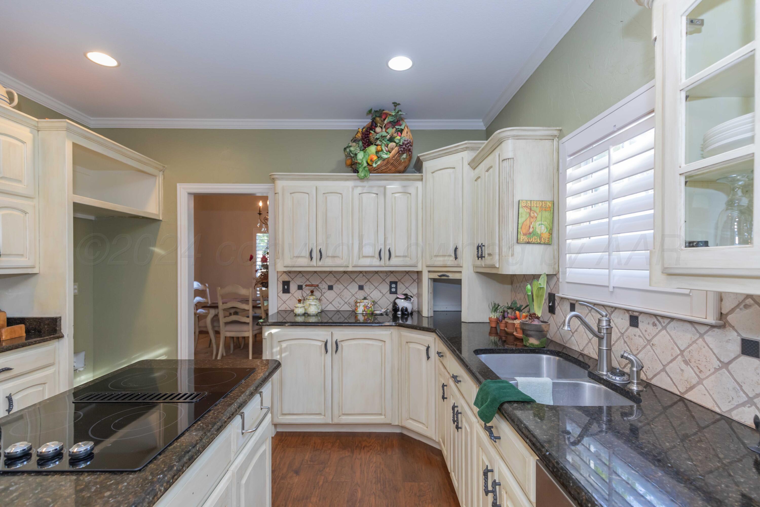7401 Bayswater Road Amarillo, TX 79119 - Photo 11 of 55 KITCHEN VIEW 3