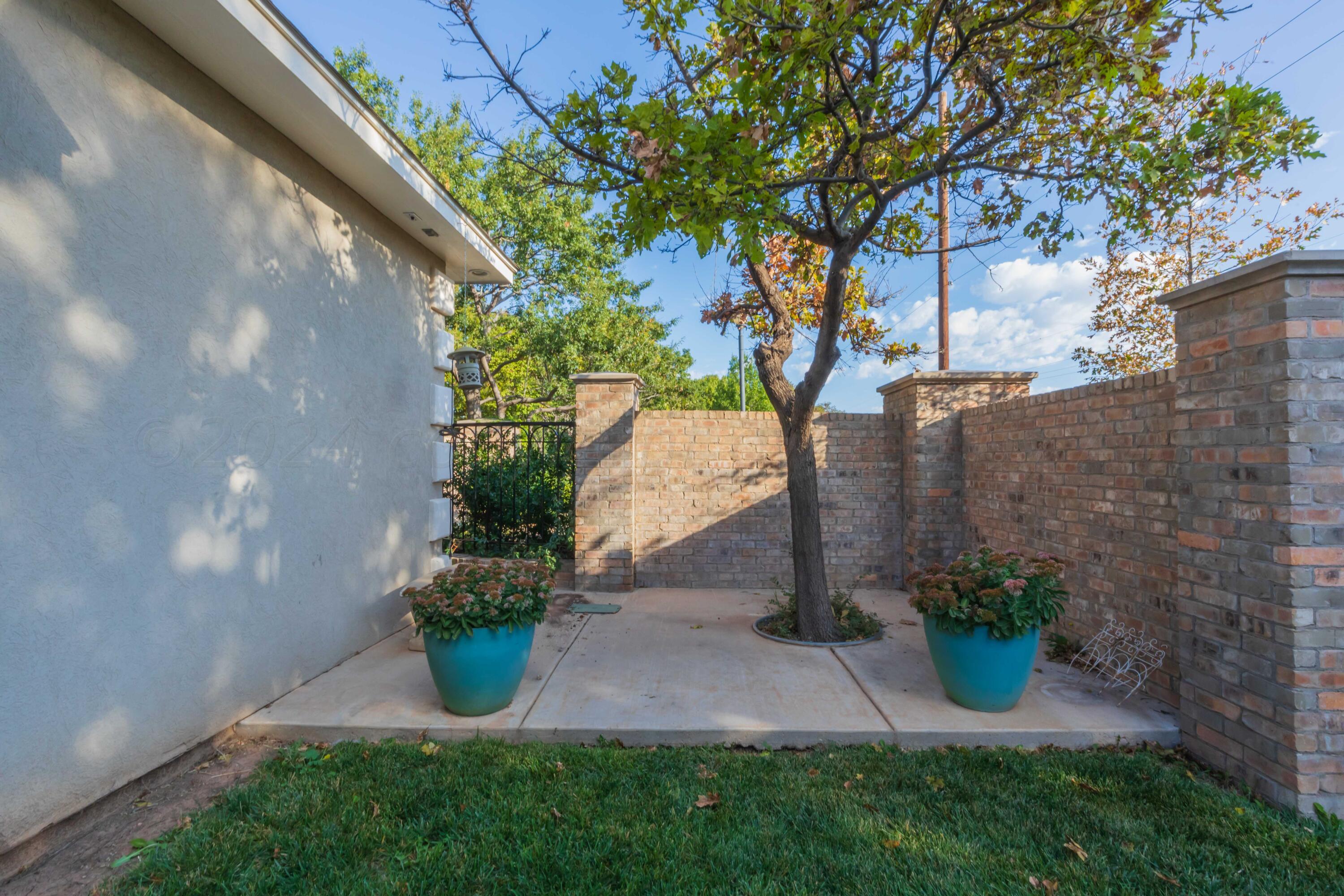 7401 Bayswater Road Amarillo, TX 79119 - Photo 46 of 55 BACKYARD VIEW 1