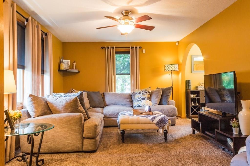 45 Winterset Drive Springfield, MA 01129 - Photo 11 of 21 a living room with furniture and a flat screen tv