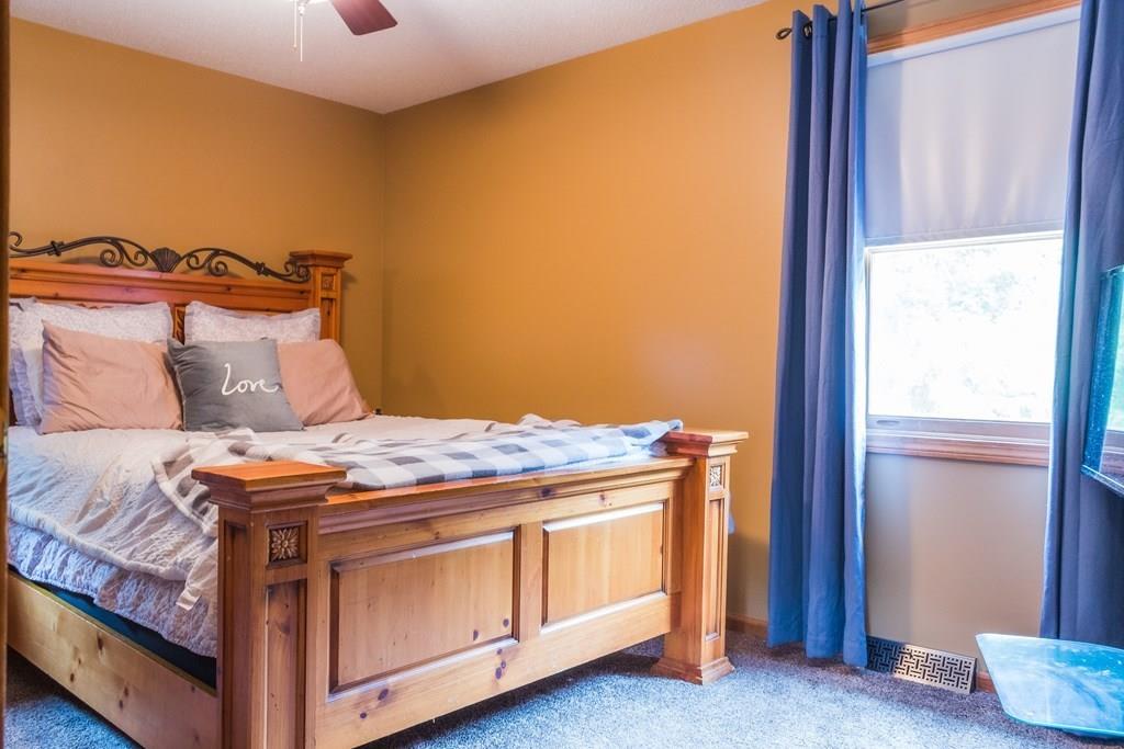 45 Winterset Drive Springfield, MA 01129 - Photo 14 of 21 a bed sitting in a bedroom next to a window