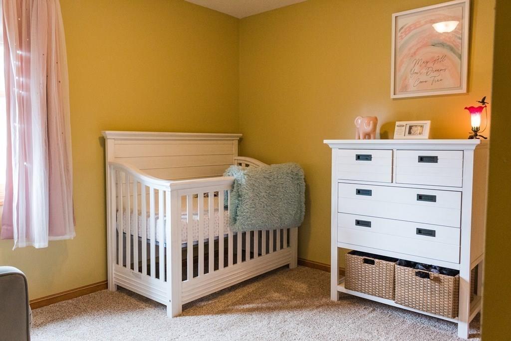 45 Winterset Drive Springfield, MA 01129 - Photo 17 of 21 a bedroom with a bed and a window