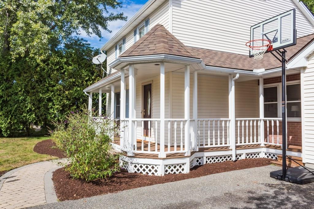 45 Winterset Drive Springfield, MA 01129 - Photo 3 of 21 a front view of a house with a garden