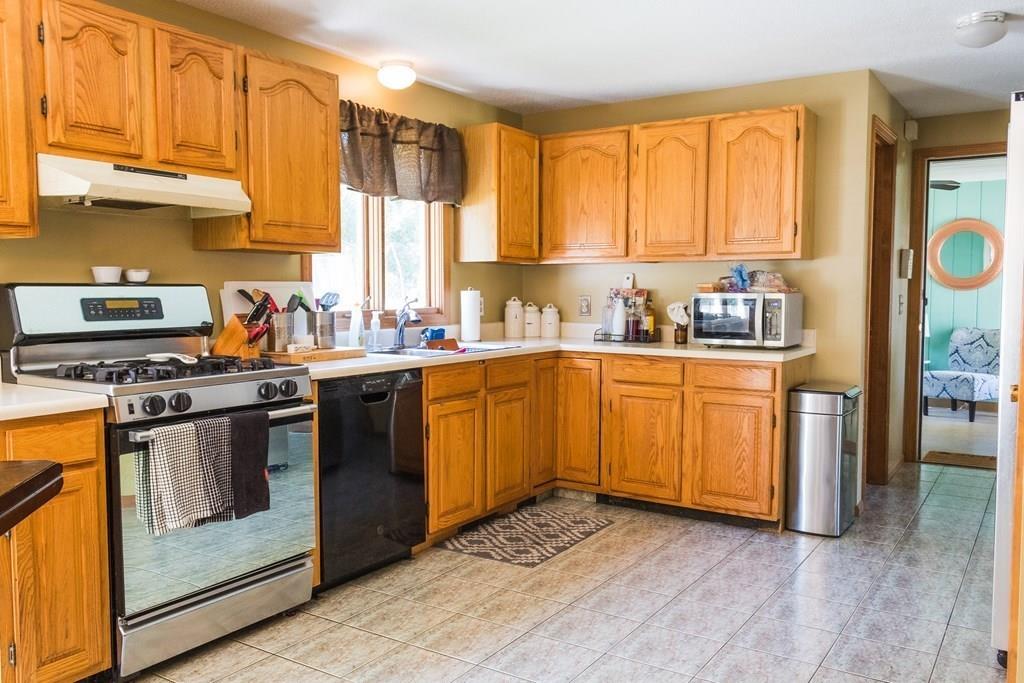 45 Winterset Drive Springfield, MA 01129 - Photo 9 of 21 a kitchen with a sink stove and cabinets