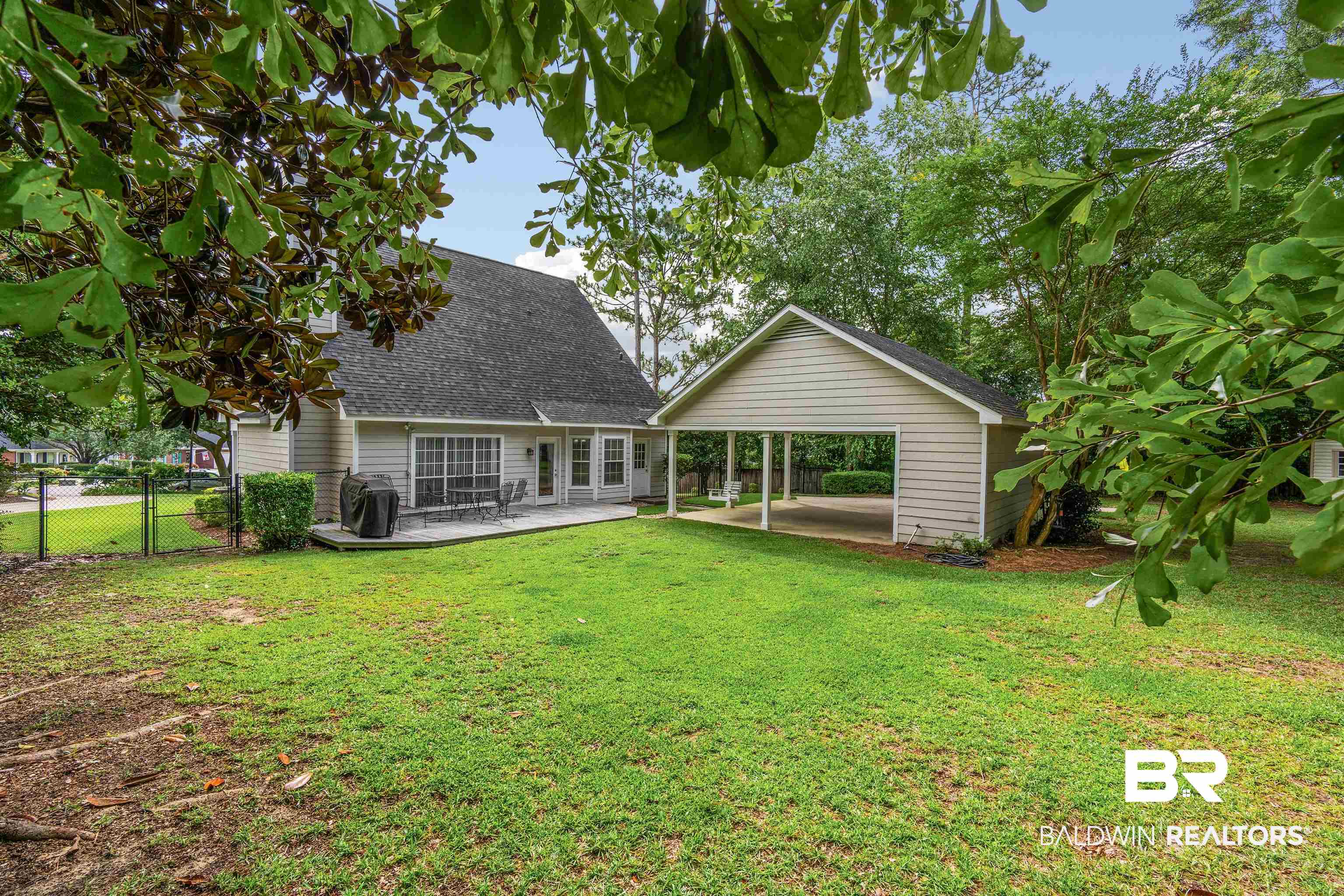 6457 Double Tree Court Mobile, AL 36695 - Photo 35 of 37 Back of property with a lawn and a carport