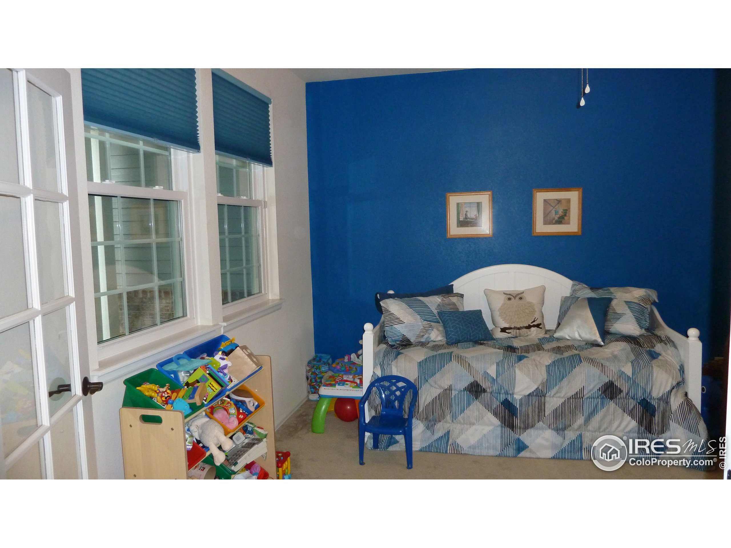 8121 Raspberry Drive Frederick, CO 80504 - Photo 13 of 38 a open kitchen with a sink and breakfast area
