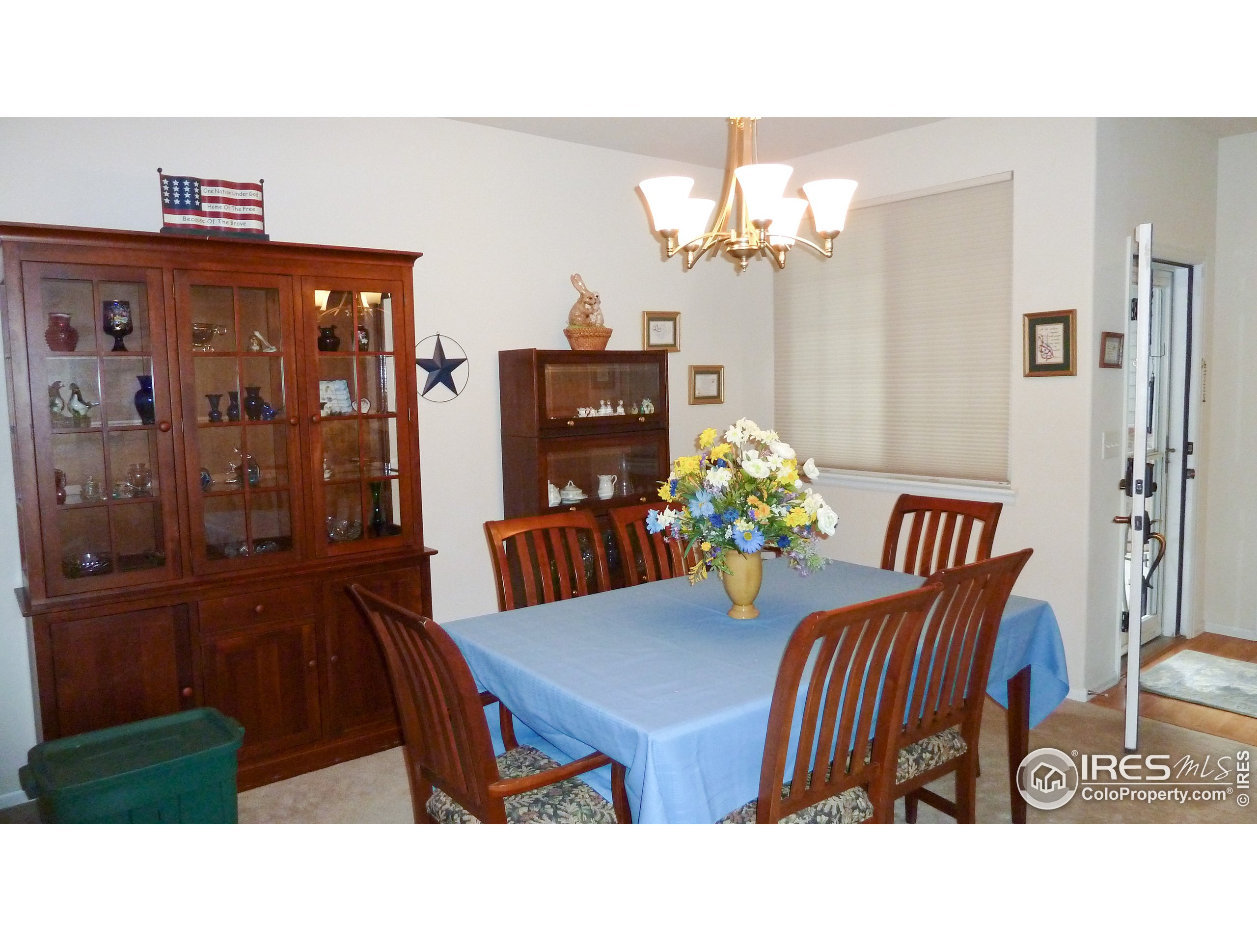 8121 Raspberry Drive Frederick, CO 80504 - Photo 15 of 38 a view of a dining room with furniture