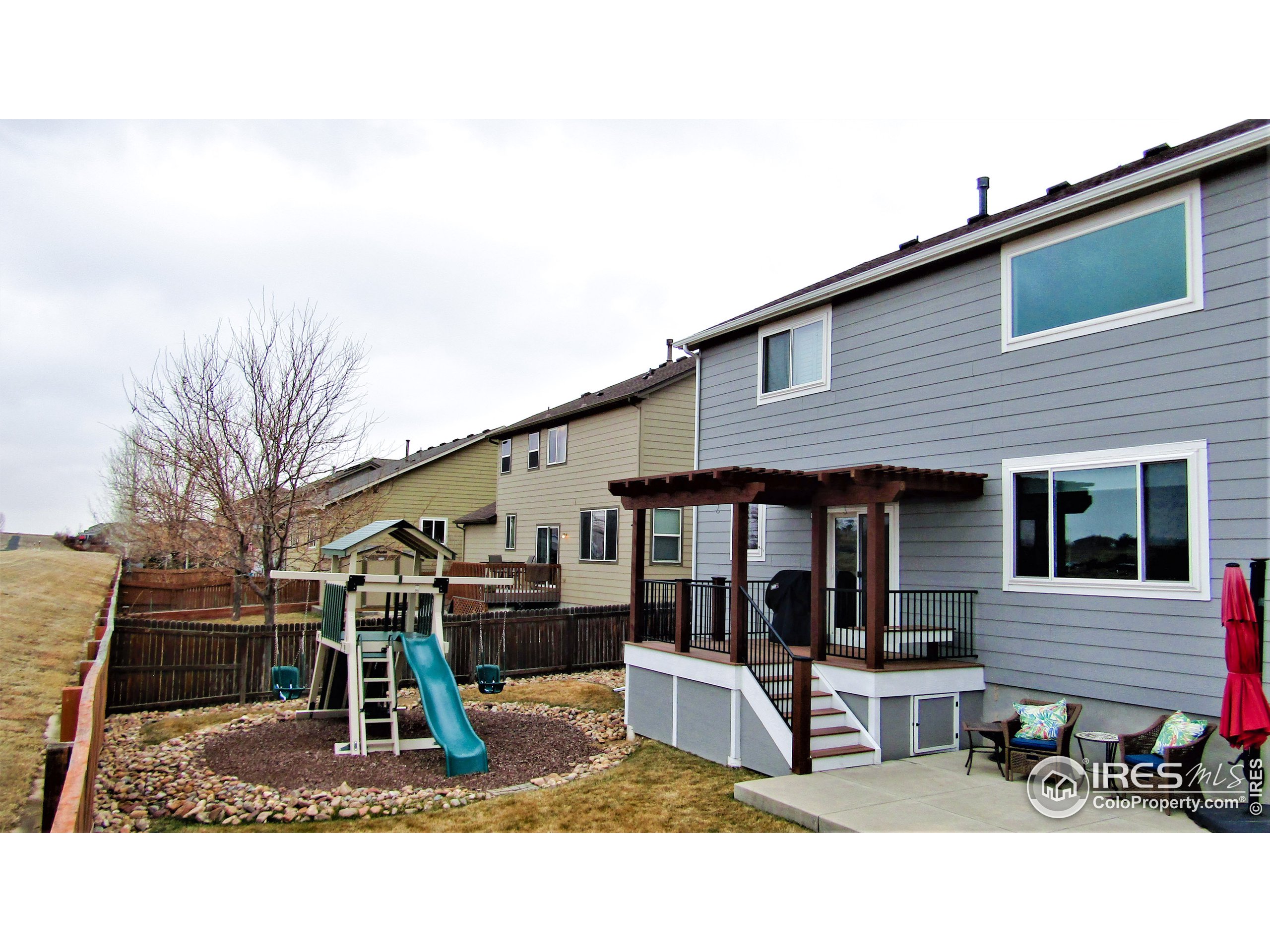8121 Raspberry Drive Frederick, CO 80504 - Photo 36 of 38 a house view with a outdoor seating