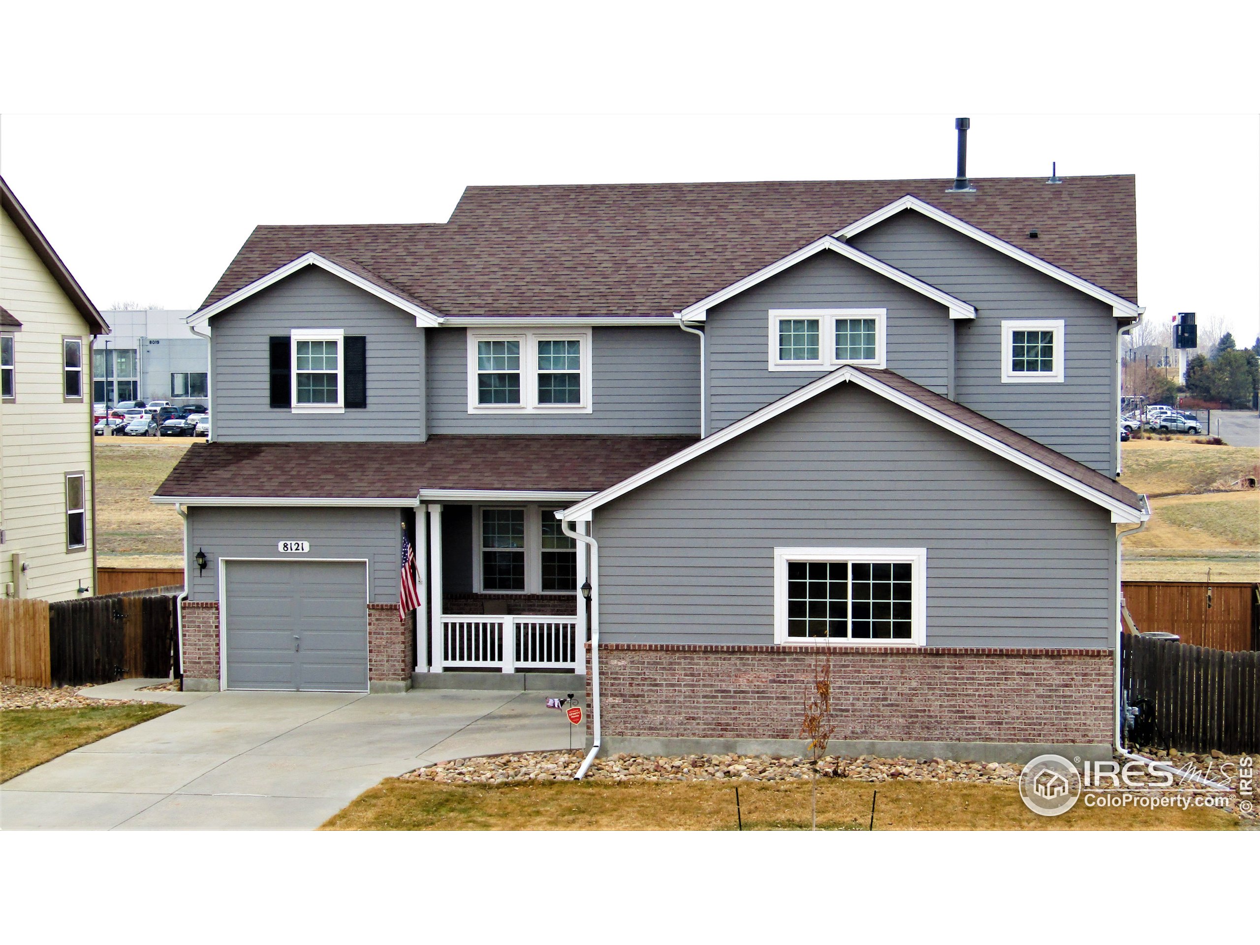 8121 Raspberry Drive Frederick, CO 80504 - Photo 38 of 38 a house that has a window in front of it