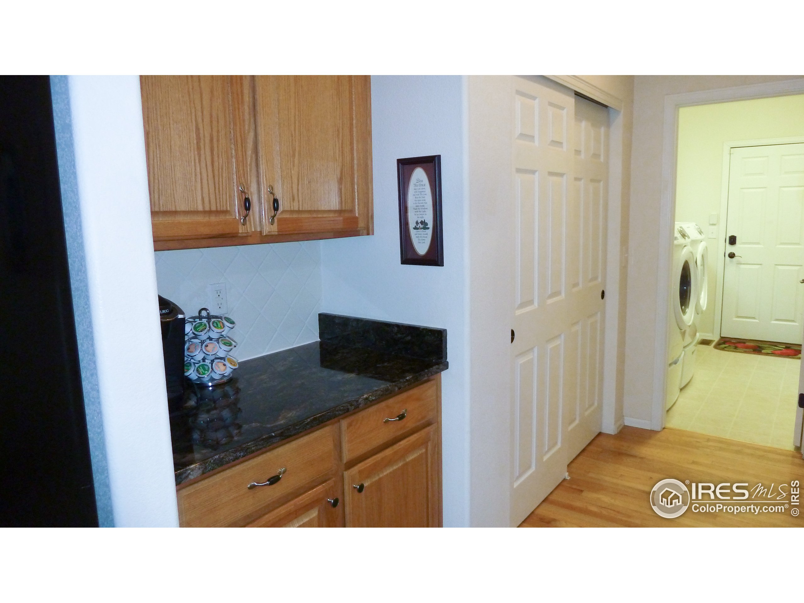 8121 Raspberry Drive Frederick, CO 80504 - Photo 5 of 38 a kitchen with a sink and cabinets