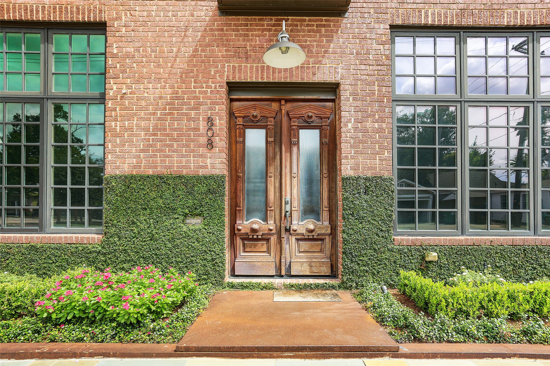 808 Coronado Street Houston, TX 77009 - Photo 32 of 50 a front view of a house with a garden