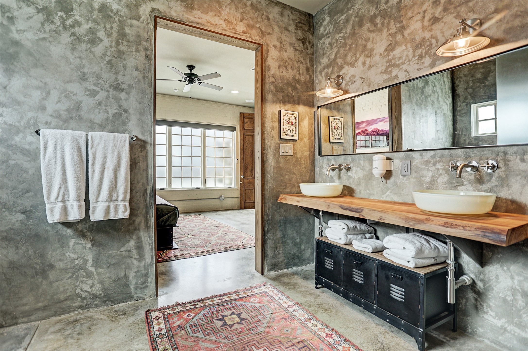 808 Coronado Street Houston, TX 77009 - Photo 37 of 50 a bathroom with a sink a vanity and a large mirror