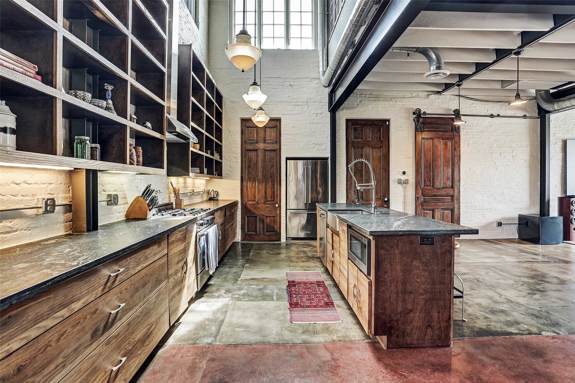 808 Coronado Street Houston, TX 77009 - Photo 40 of 50 a kitchen with stainless steel appliances granite countertop lots of counter top space and wooden floor