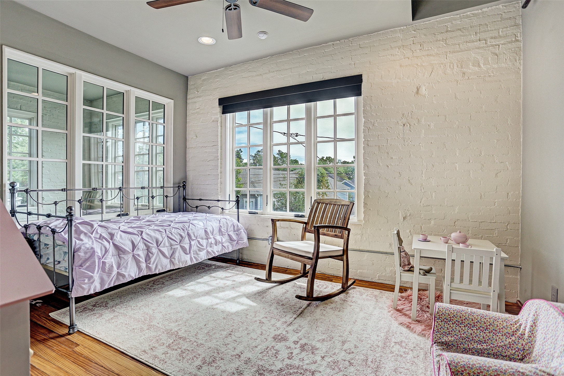 808 Coronado Street Houston, TX 77009 - Photo 43 of 50 a bedroom with a bed and a couch