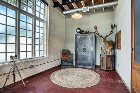 a view of livingroom with furniture and windows