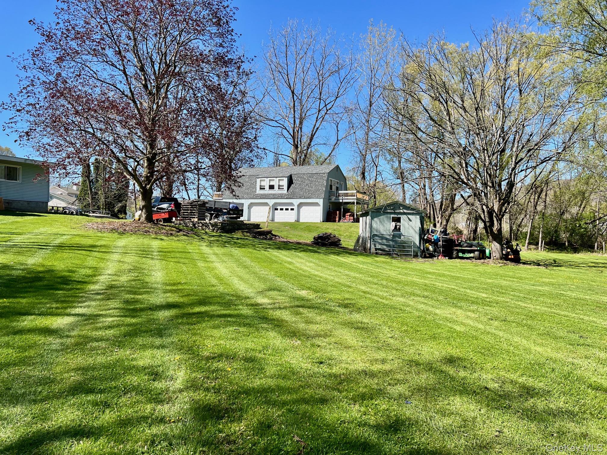24 Wilson Eaton Road Amenia, NY 12501 - Photo 20 of 20 a view of a park with large trees and a big yard