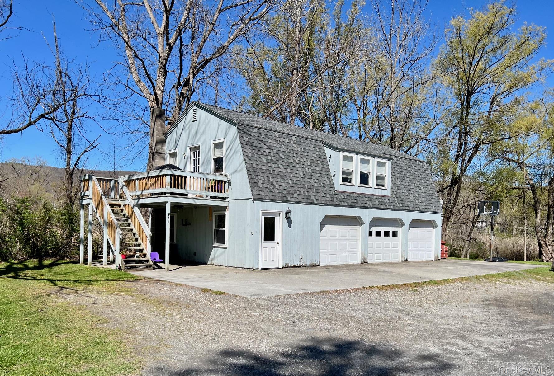 24 Wilson Eaton Road Amenia, NY 12501 - Photo 4 of 20 a front view of a house with a yard