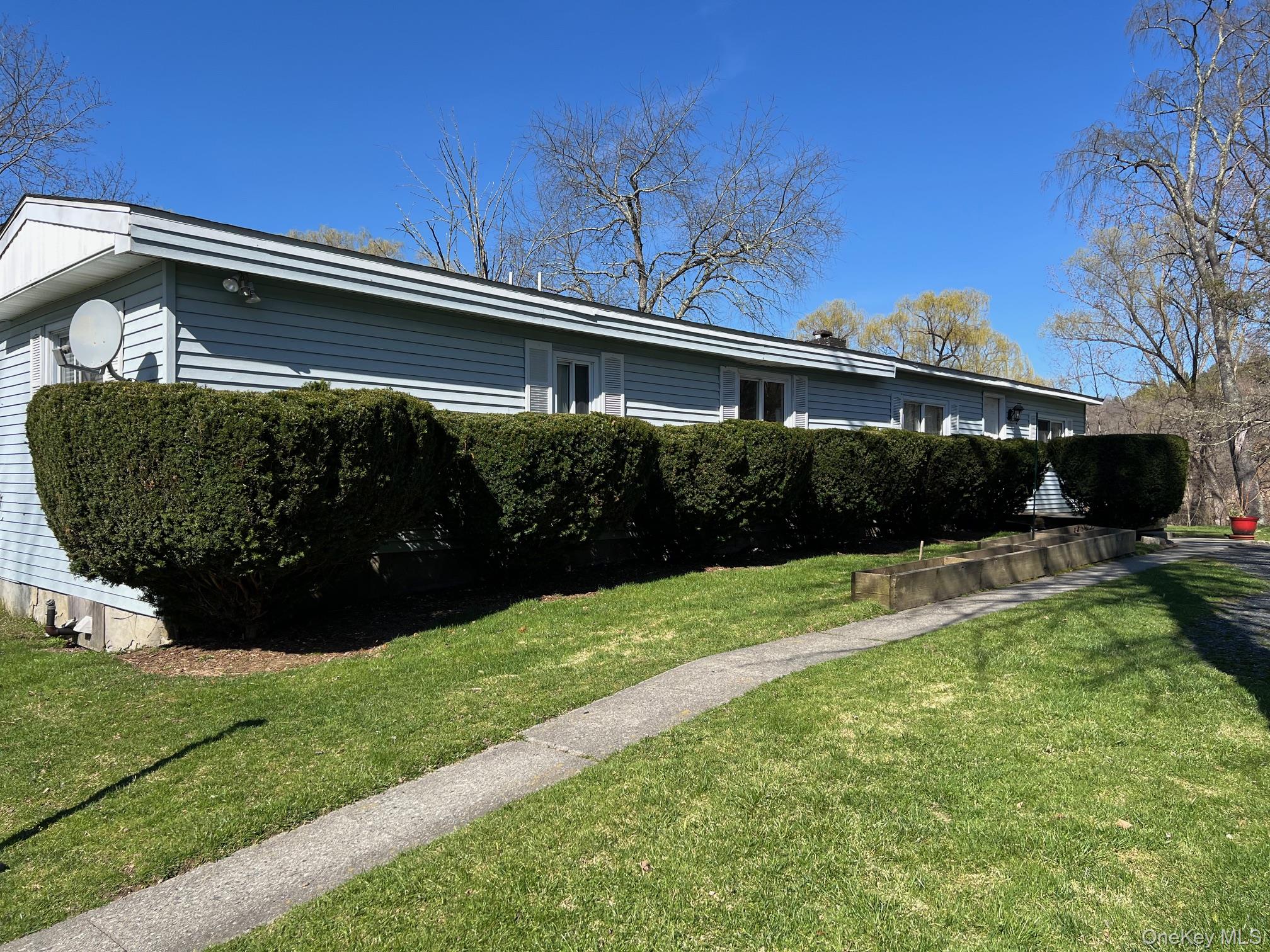 24 Wilson Eaton Road Amenia, NY 12501 - Photo 7 of 20 a front view of a house with a yard