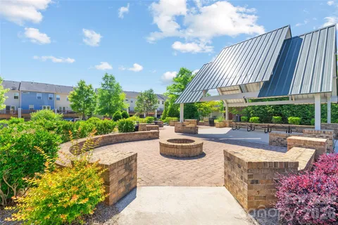 a view of house with outdoor seating space