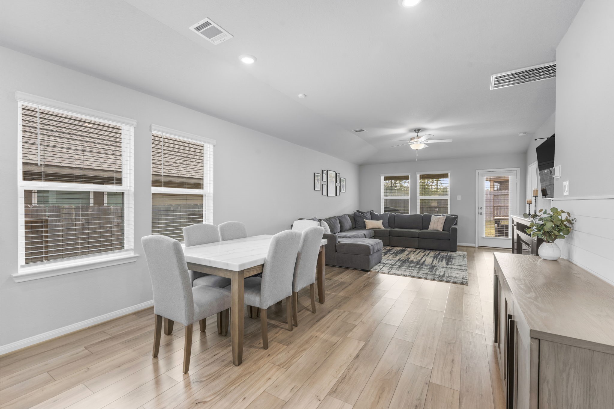 18581 Meadow Point Lane Montgomery, TX 77316 - Photo 11 of 44 a view of a dining room with furniture window and wooden floor