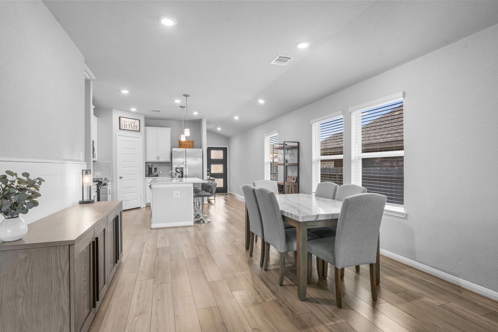 18581 Meadow Point Lane Montgomery, TX 77316 - Photo 12 of 44 a view of a dining room with furniture window and wooden floor