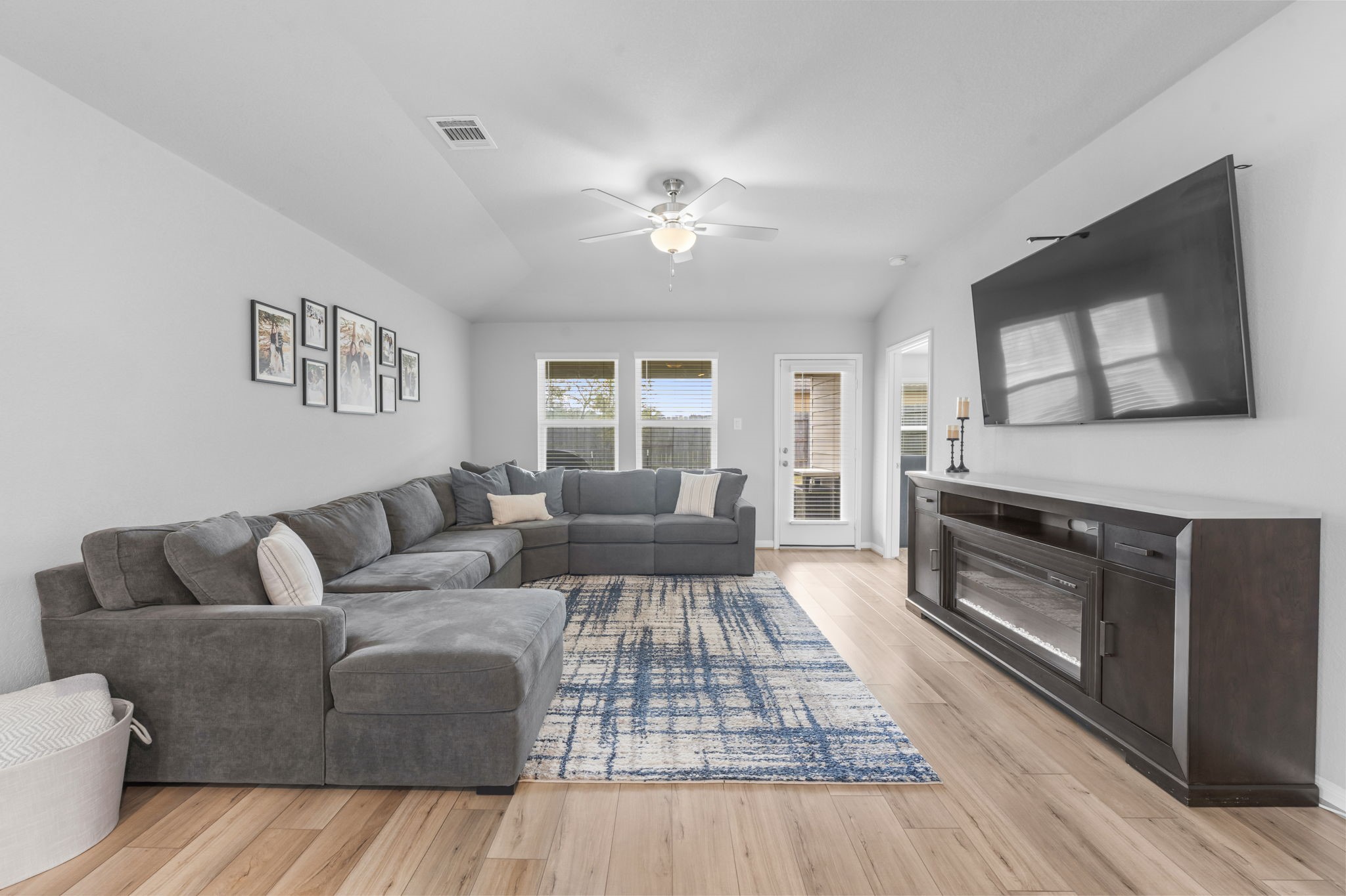 18581 Meadow Point Lane Montgomery, TX 77316 - Photo 15 of 44 a living room with furniture and a fireplace