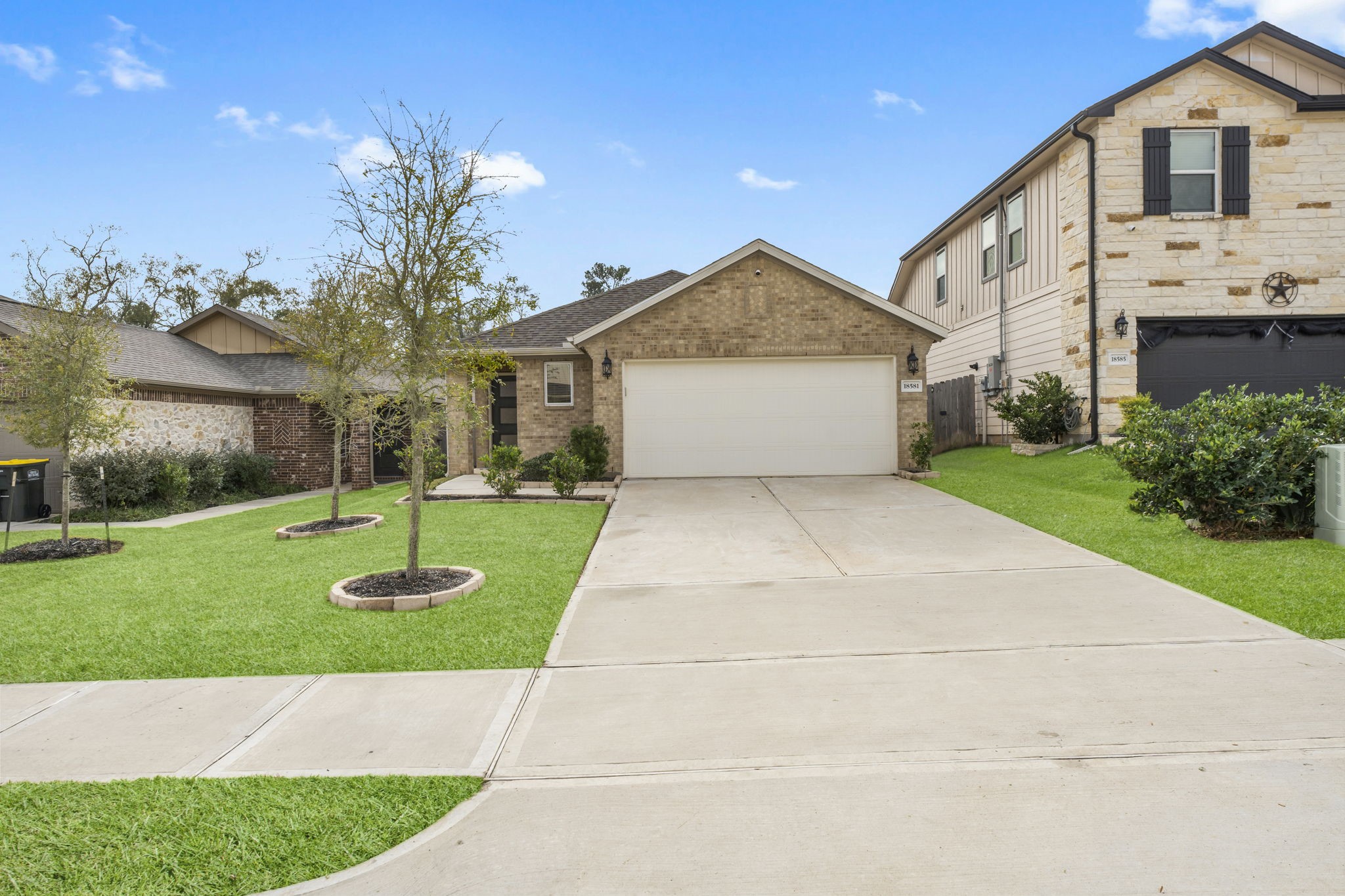 18581 Meadow Point Lane Montgomery, TX 77316 - Photo 2 of 44 a view of a house with a yard and pathway
