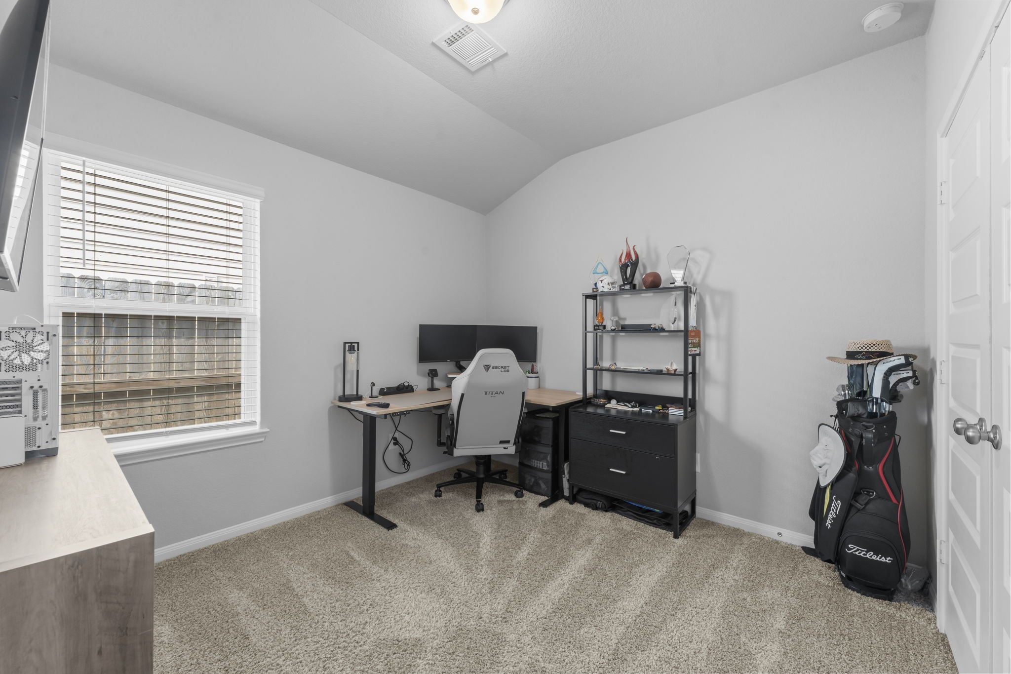 18581 Meadow Point Lane Montgomery, TX 77316 - Photo 27 of 44 a room with a workspace and a window