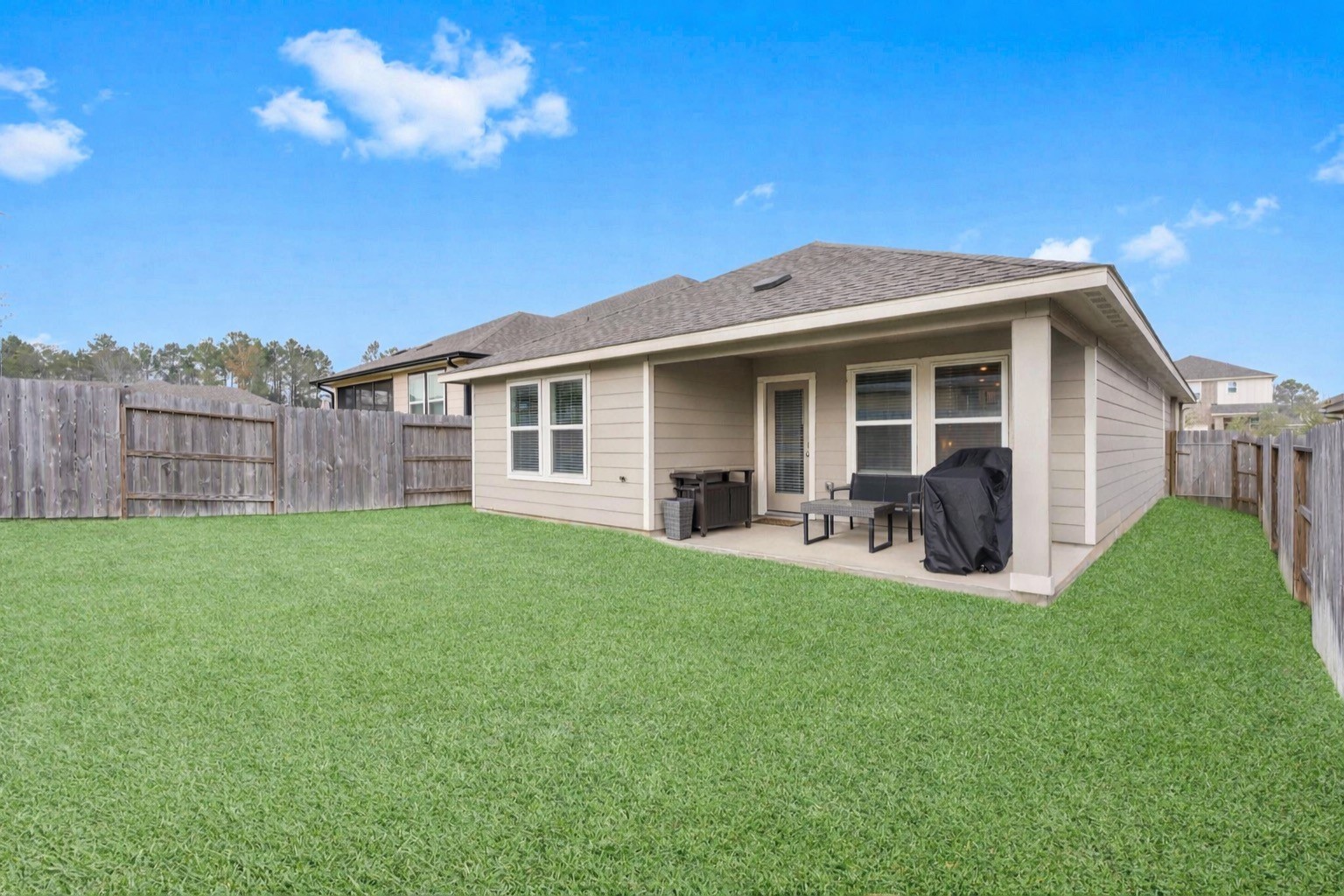 18581 Meadow Point Lane Montgomery, TX 77316 - Photo 29 of 44 a view of a house with backyard porch and garden