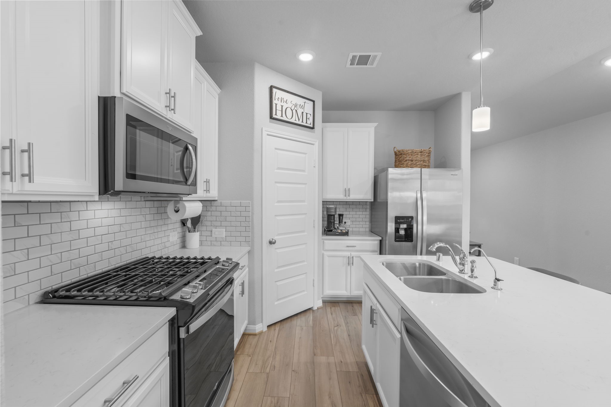 18581 Meadow Point Lane Montgomery, TX 77316 - Photo 8 of 44 a kitchen with stainless steel appliances granite countertop a sink stove and refrigerator