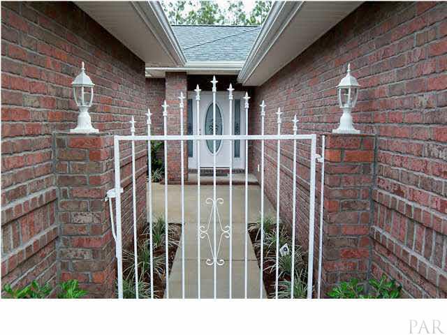 3021 Wallace Lake Road Pace, FL 32571 - Photo 3 of 22 Entry Gate to your private Courtyard