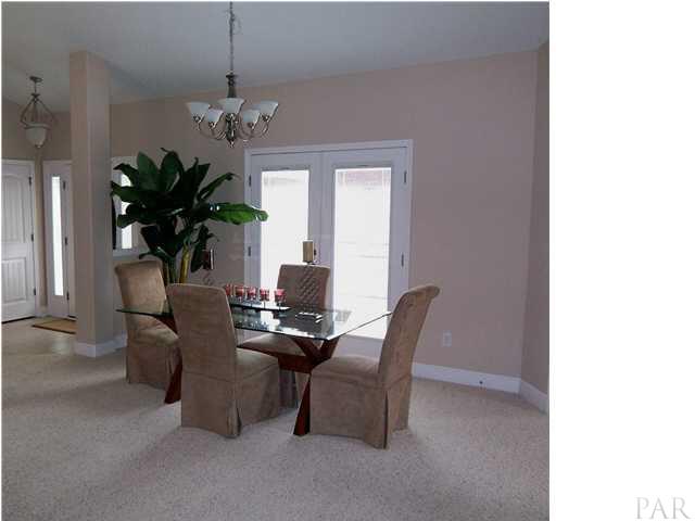 3021 Wallace Lake Road Pace, FL 32571 - Photo 8 of 22 The Dining Area that looks out to the courtyard.....