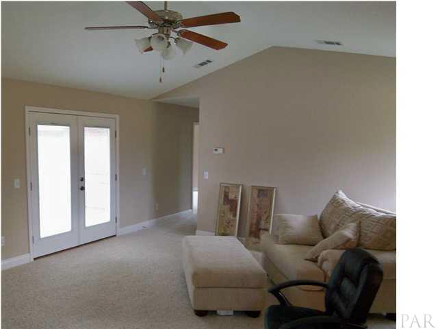 3021 Wallace Lake Road Pace, FL 32571 - Photo 9 of 22 Adjacent to the Great Room ......a Family Room also opening on the courtyard....