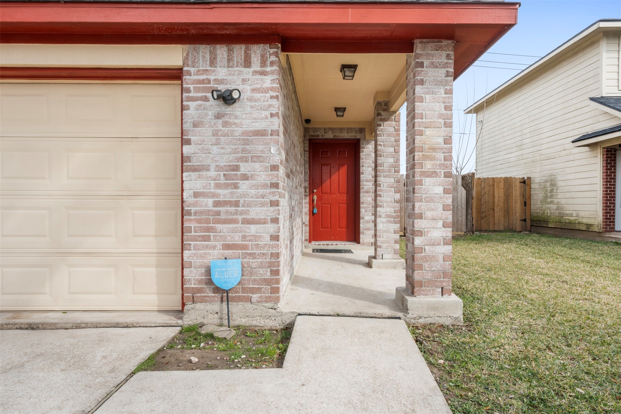 13615 Ambrose Street Houston, TX 77045 - Photo 2 of 35 a front view of a house with a yard