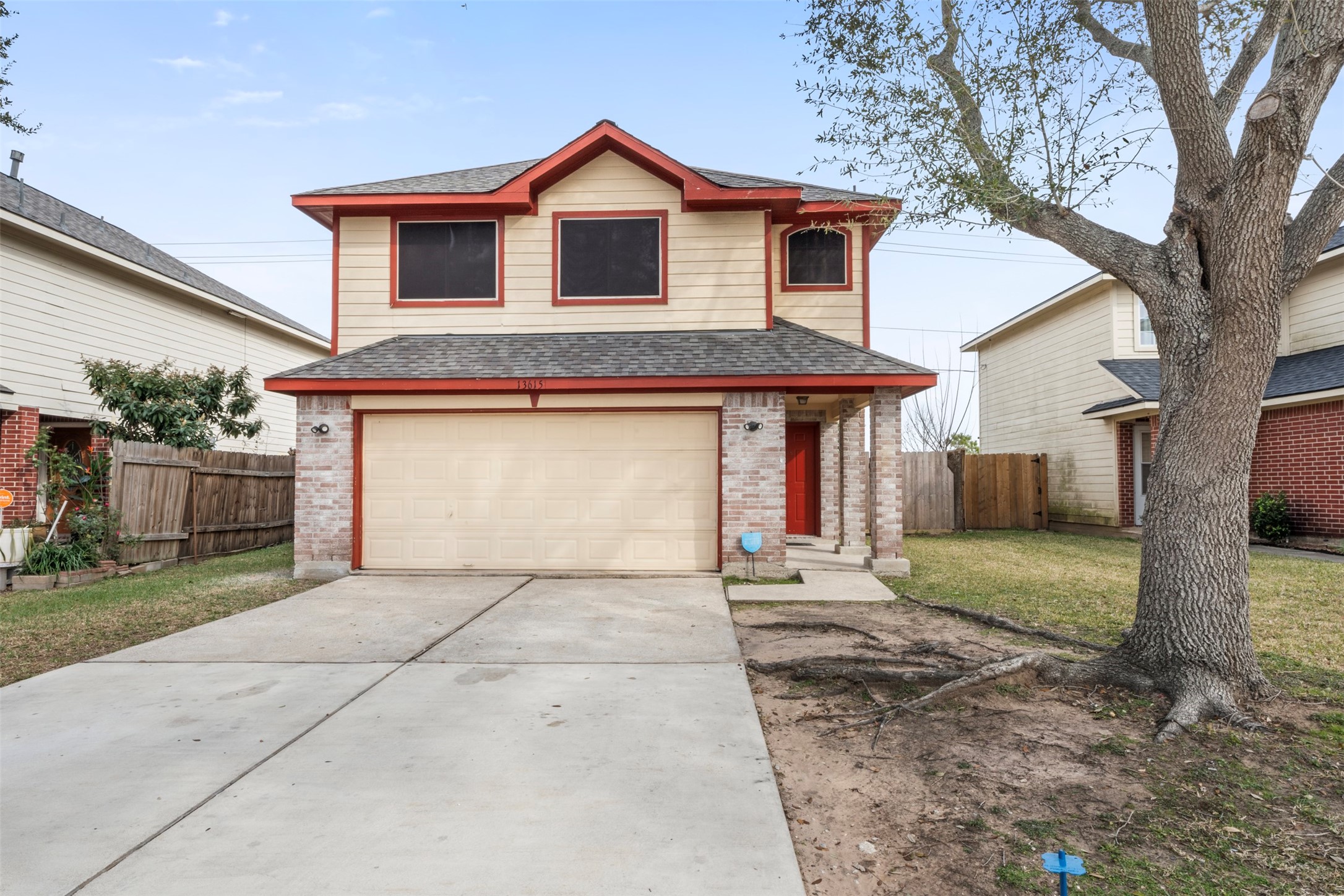 13615 Ambrose Street Houston, TX 77045 - Photo 27 of 35 a front view of a house with garden