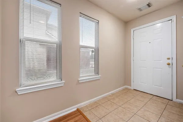 a view of an empty room and window