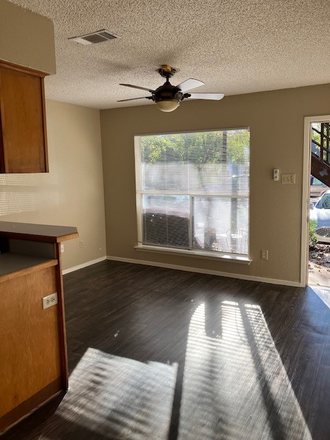 2306 East 8th Street, Unit 5 Austin, TX 78702 - Photo 2 of 9 a view of a room with wooden floor and a window