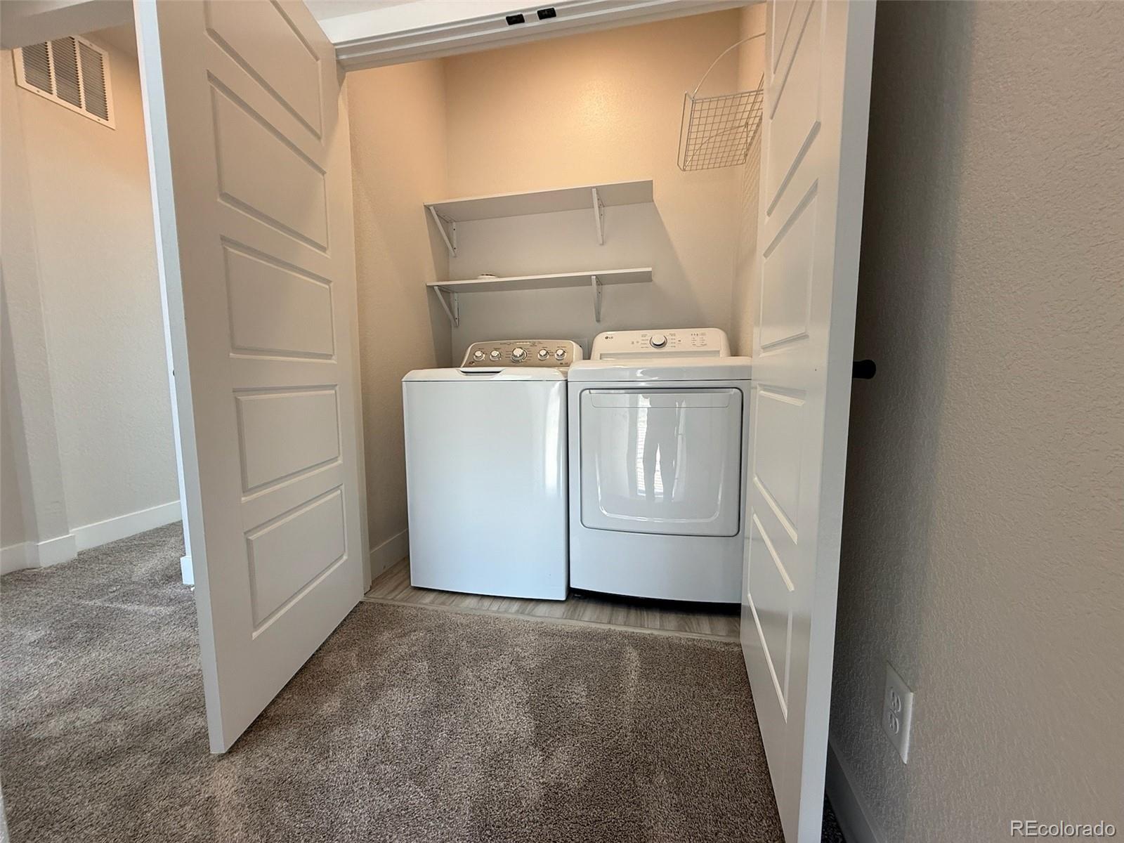 12355 Farmview Lane Thornton, CO 80241 - Photo 31 of 42 a view of washer and dryer