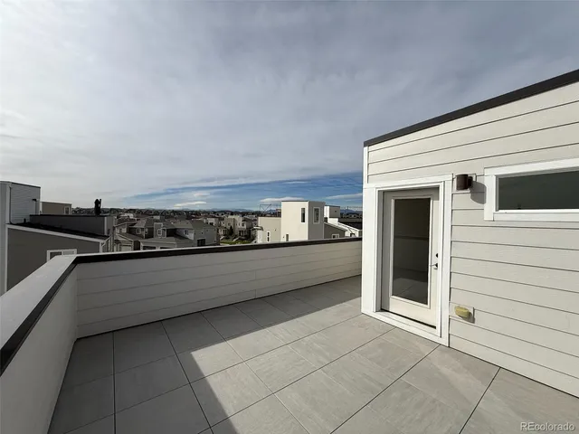 a view of a utility room with windows