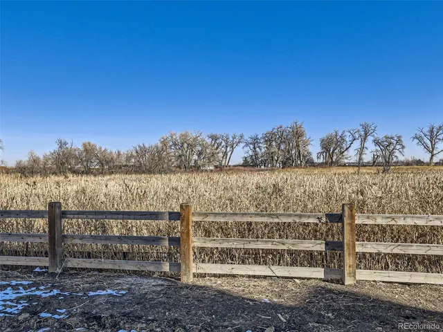 a view of a bench next to a river