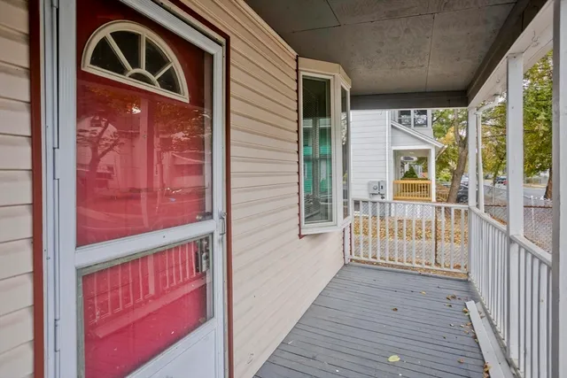a front view of a house with large windows