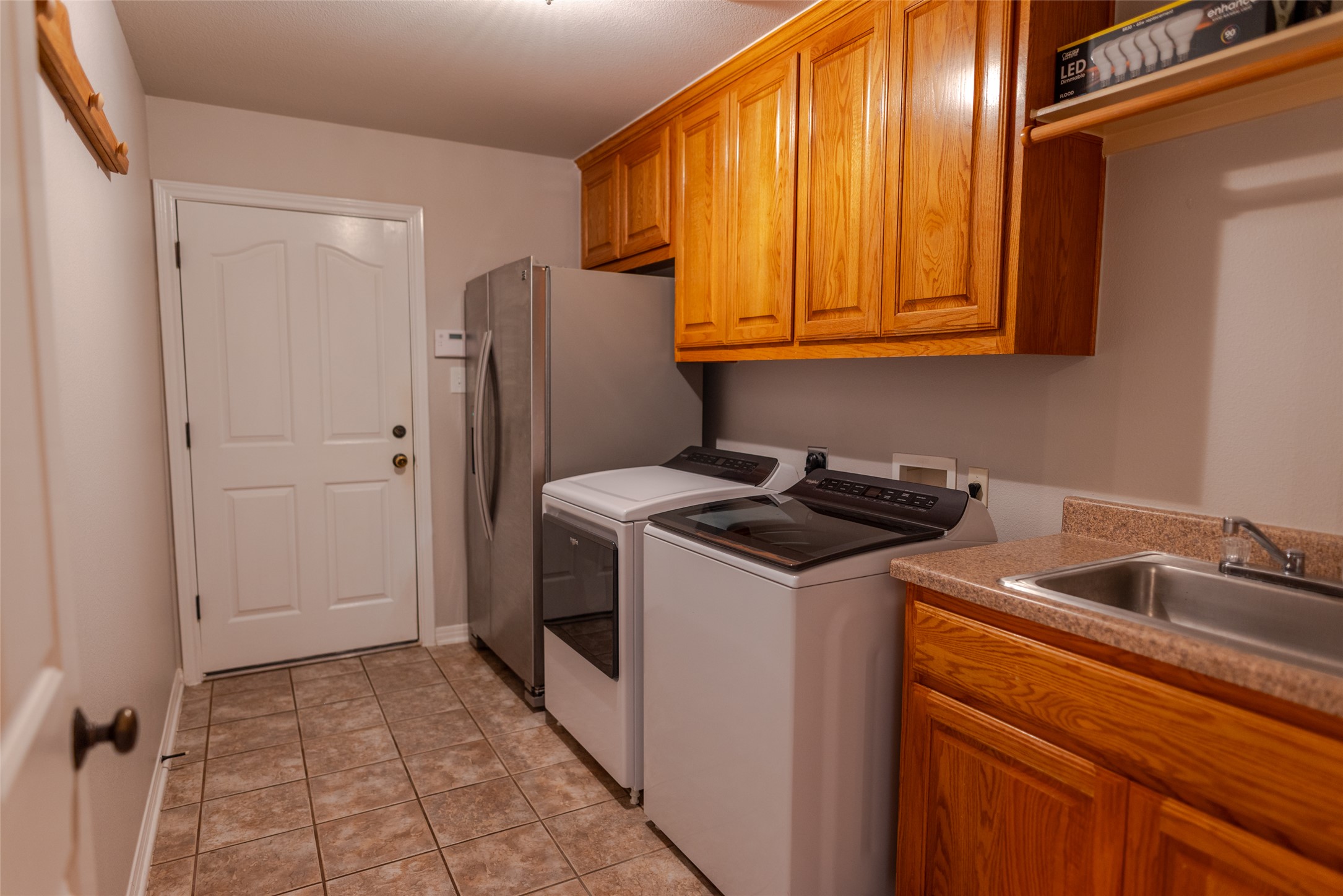 748 Nelson Ranch Road Cedar Park, TX 78613 - Photo 22 of 24 a utility room with dryer and washer