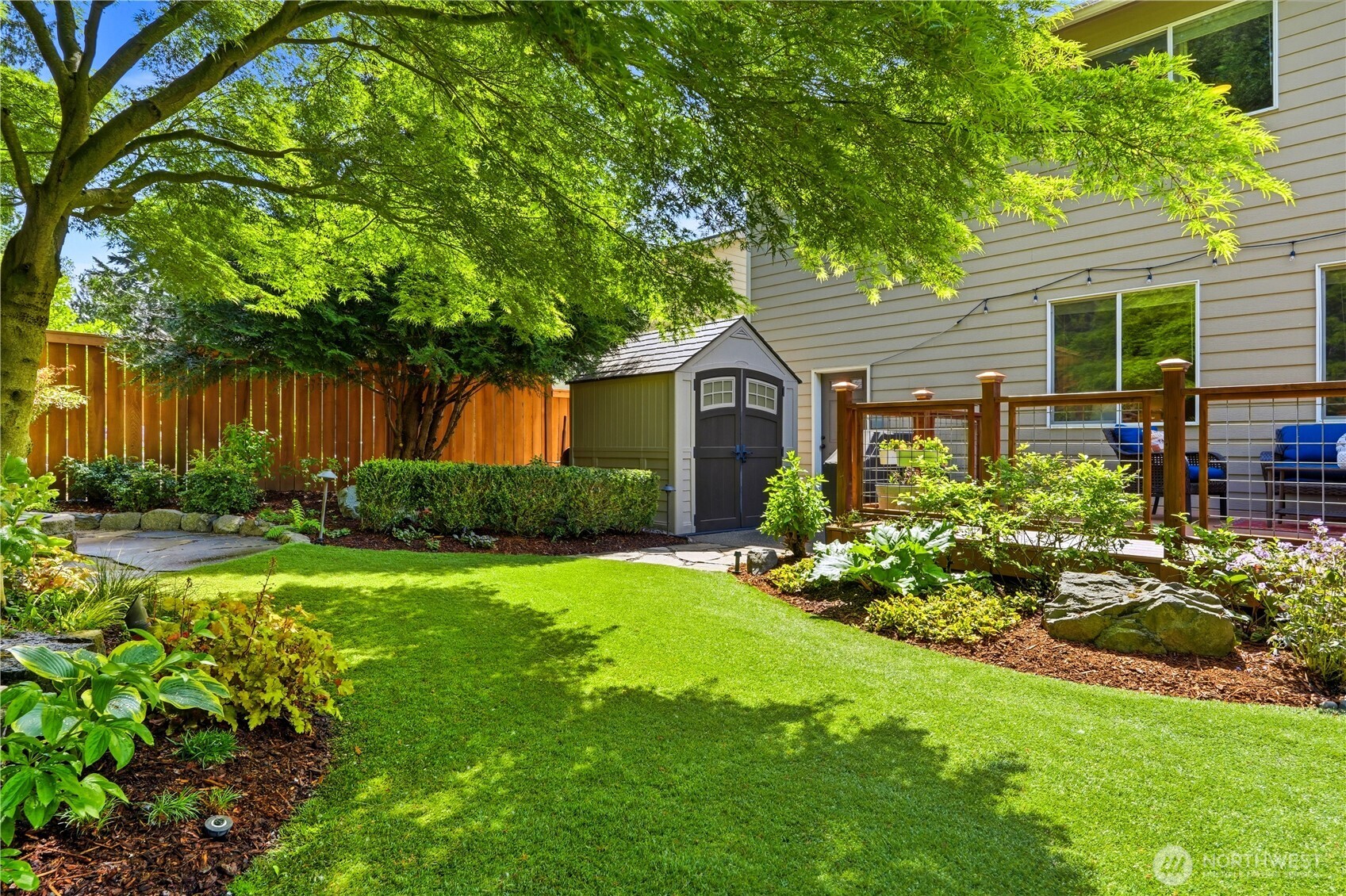 13410 Southeast 252nd Street Kent, WA 98042 - Photo 17 of 38 a front view of a house with garden