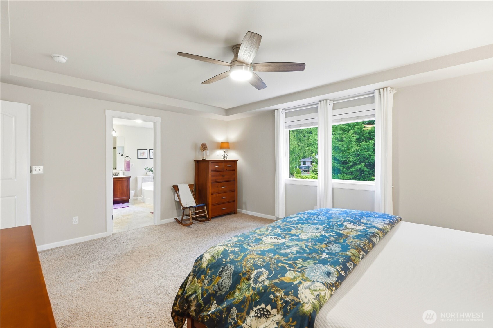 13410 Southeast 252nd Street Kent, WA 98042 - Photo 27 of 38 a bedroom with a bed and large windows
